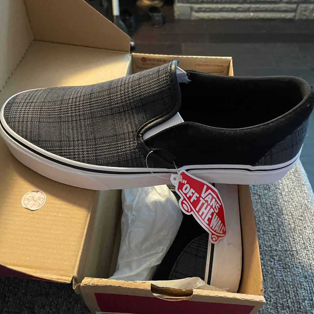 Brand new Vans classic slip ons
